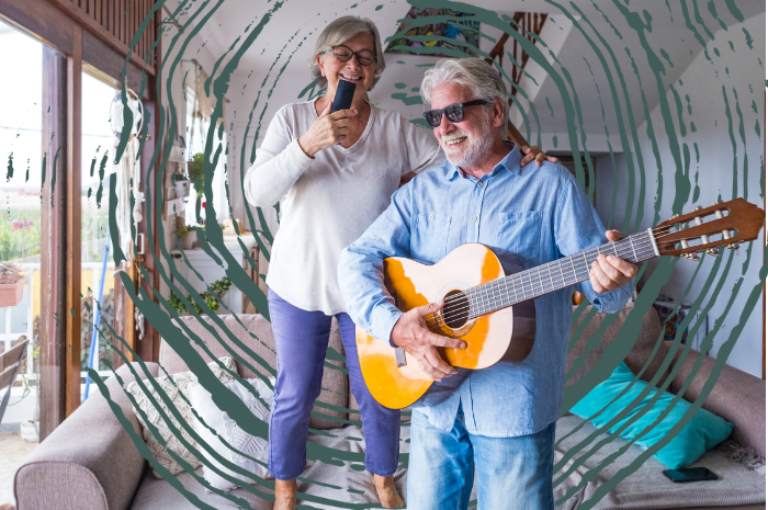Older people singing and playing a guitar