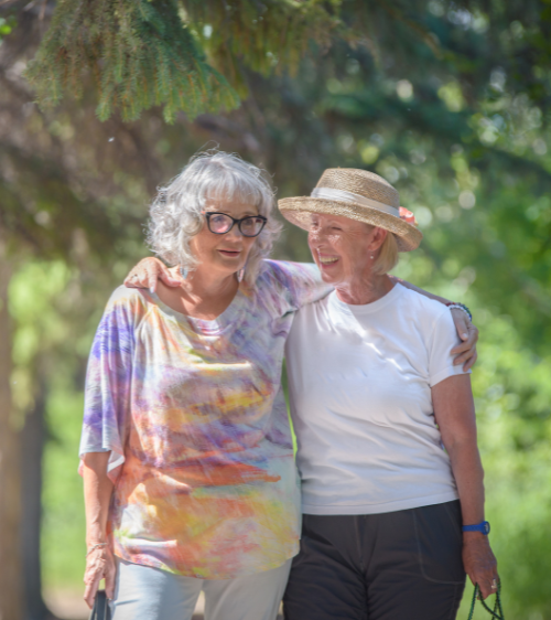 Two women walking together outside